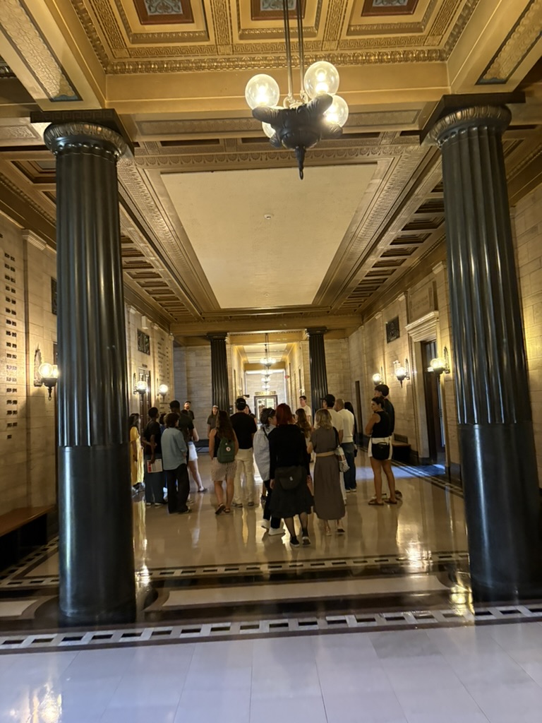 A prospective student tour group walking through a McGill University academic building