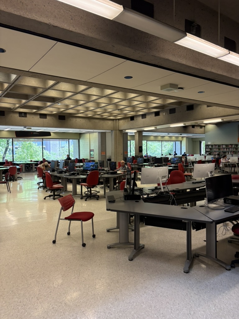 Students studying at computer workstations in a McGill University library